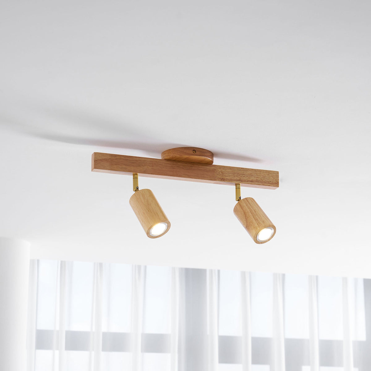 Grain wood shade track spotlight with three heads on a wooden bar for warm kitchen lighting on Tampa Home & Garden Store