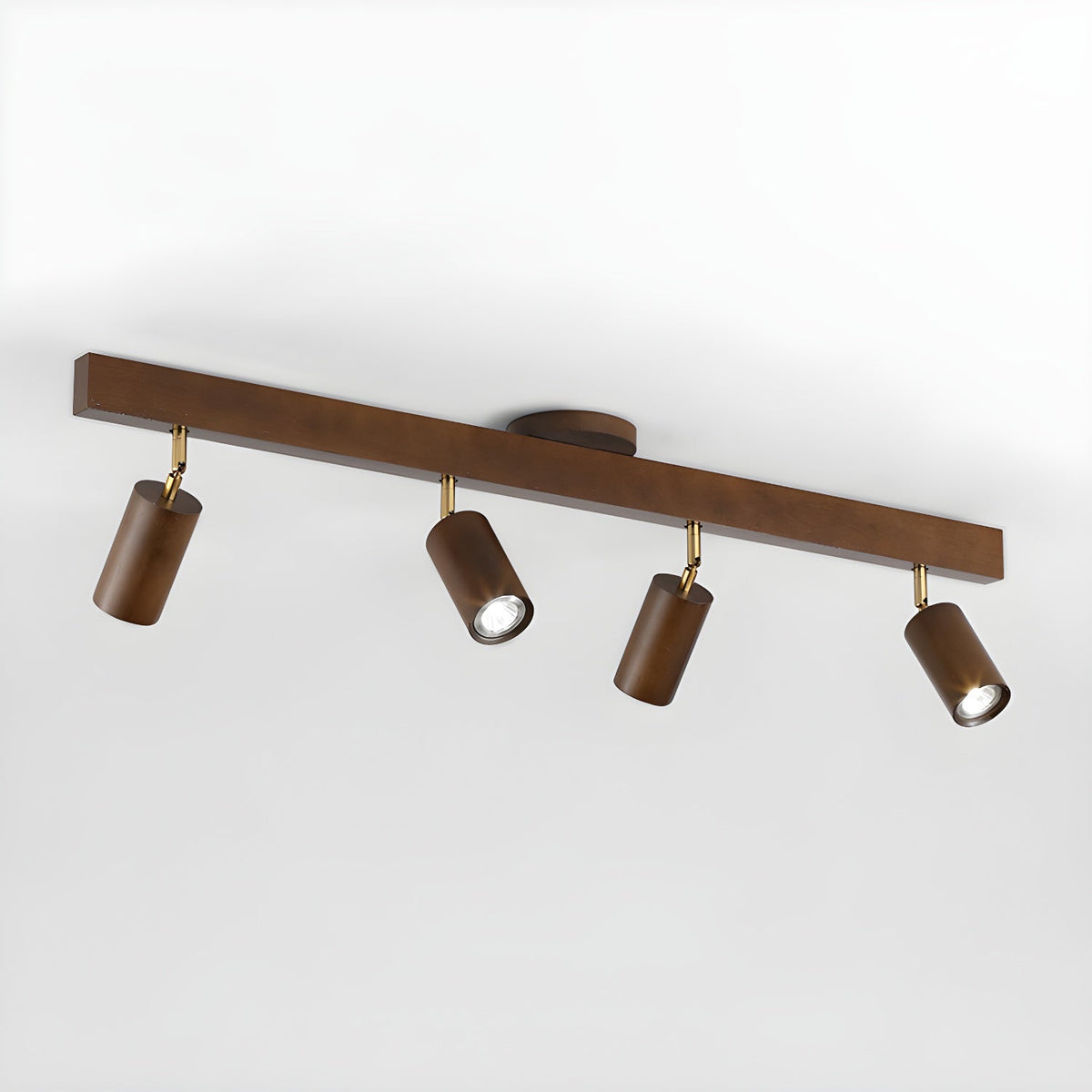 Grain wood shade track lighting fixture by Moktan Sabai with four adjustable brown heads on Tampa Home & Garden Store