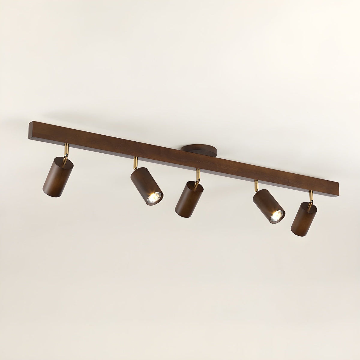 Moktan Sabai Grain wood shade track lighting with five adjustable brown heads on a bar on Tampa Home & Garden Store
