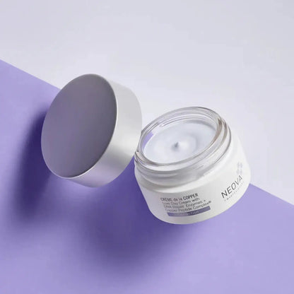 Neova Creme de la Copper 1.7 oz anti-aging skincare jar with silver lid on purple backdrop on Tampa Home & Garden Store