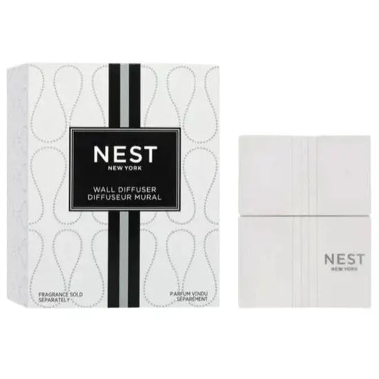 Nest Wall Diffuser device white beside its white box with Nest New York branding on Tampa Home & Garden Store