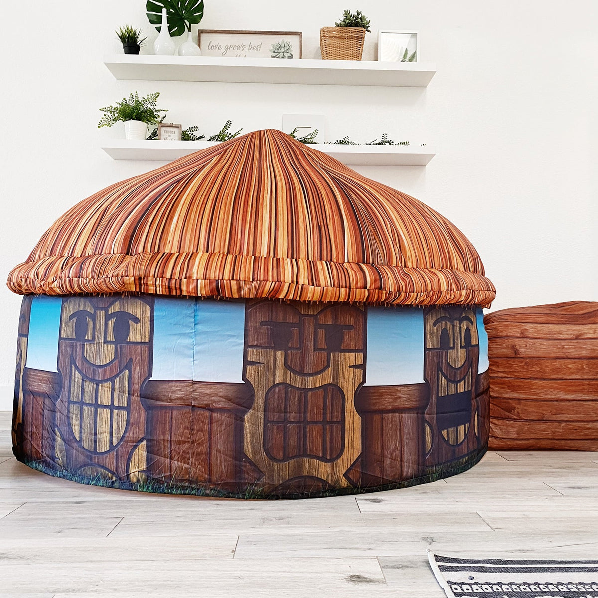AirFort Tiki Hut inflatable kids play fort with orange striped thatch roof and tiki-print base by AirFort.com on Tampa Home & Garden Store