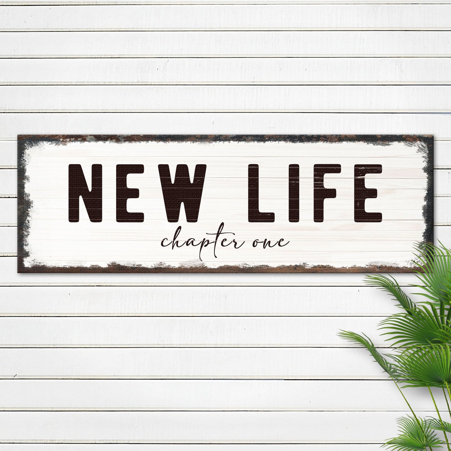 New Life Chapter One Sign canvas by Tailored Canvases, white distressed sign with bold NEW LIFE text and script chapter one on Tampa Home & Garden Store