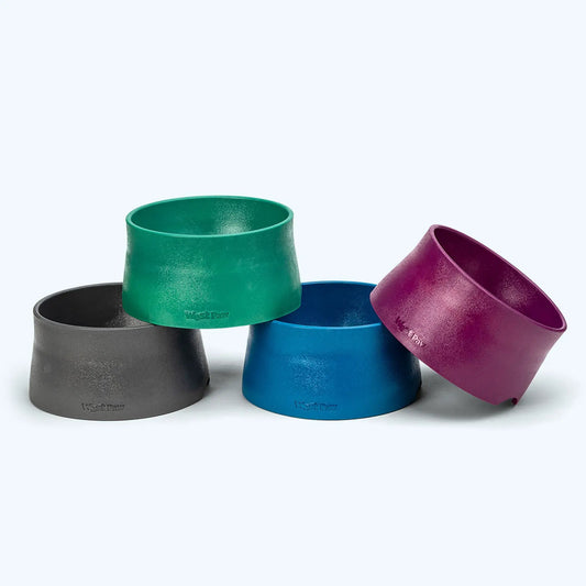 Non-Slip dog bowls set in gray, green, blue, and purple with West Paw logo on Tampa Home & Garden Store