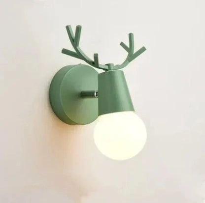 Forest Haven Antler Wall Sconce green metal wall light with antler arms Moktan Sabai on Tampa Home & Garden Store