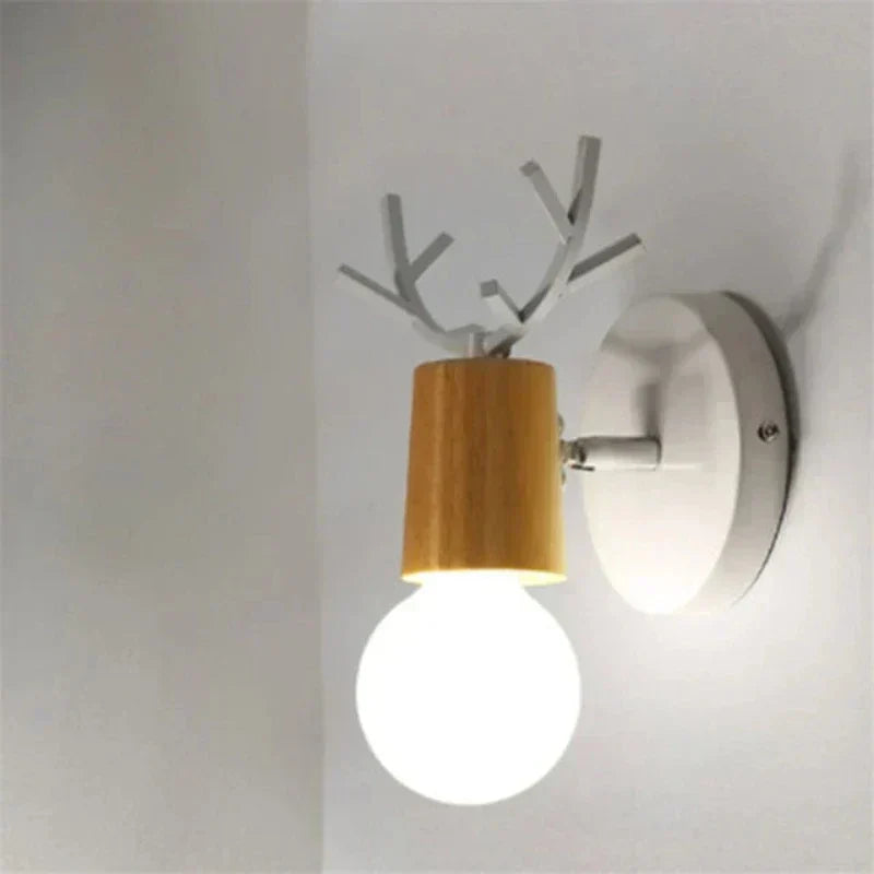 Forest Haven antler wall sconce with wooden cylinder shade and white bulb Moktan Sabai on Tampa Home & Garden Store