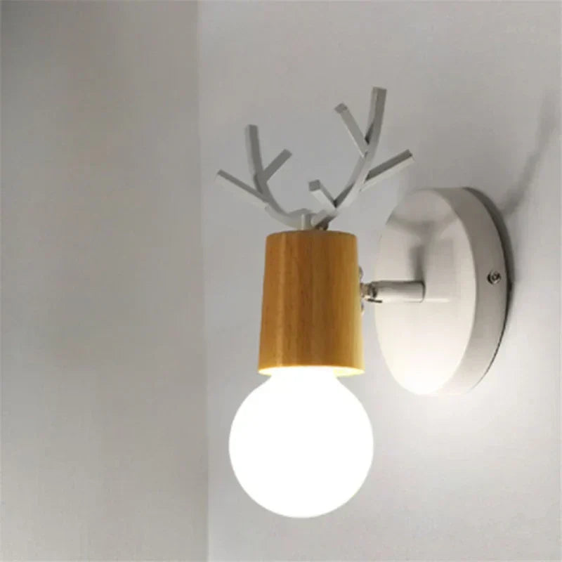 Forest Haven Antler Wall Sconce with wooden cylinder shade and white antler branches on Tampa Home & Garden Store