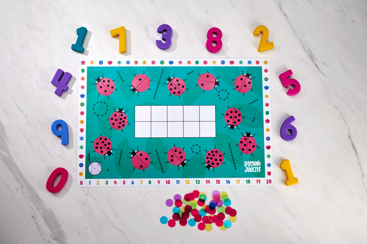 Bag of Counting Chips by Domino & Juliette; teal ladybug board with rainbow numbers and chips on Tampa Home & Garden Store