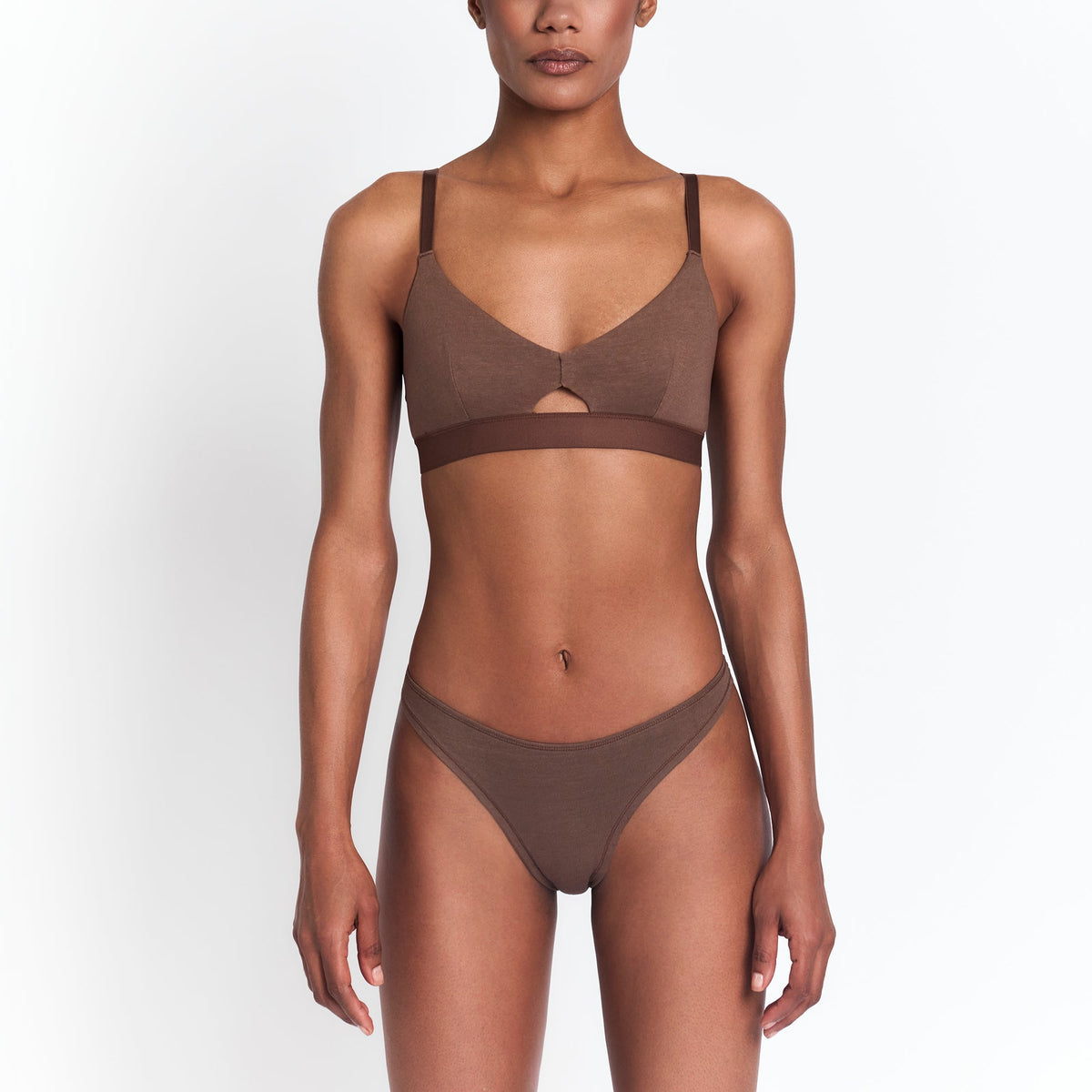 Hemp thong in brown with a wide waistband on model by Net Positive on Tampa Home & Garden Store