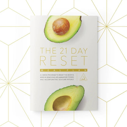 The 21 Day Reset meal plan booklet with avocado halves on a white cover, OWL Venice branding on Tampa Home & Garden Store