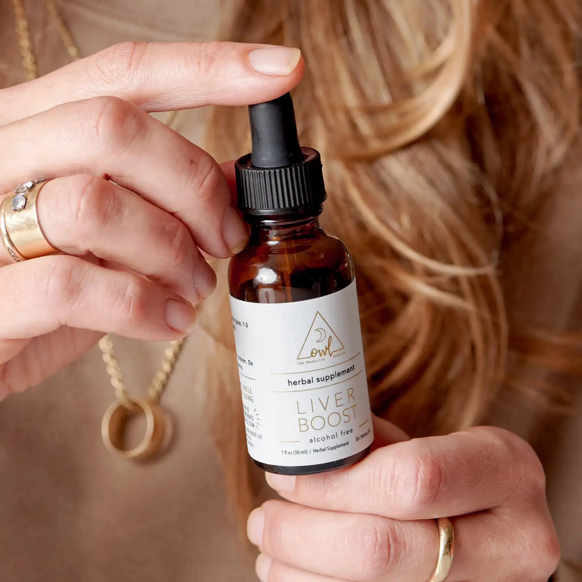 Liver Boost herbal supplement dropper bottle by OWL Venice, amber glass, dropper cap on Tampa Home & Garden Store