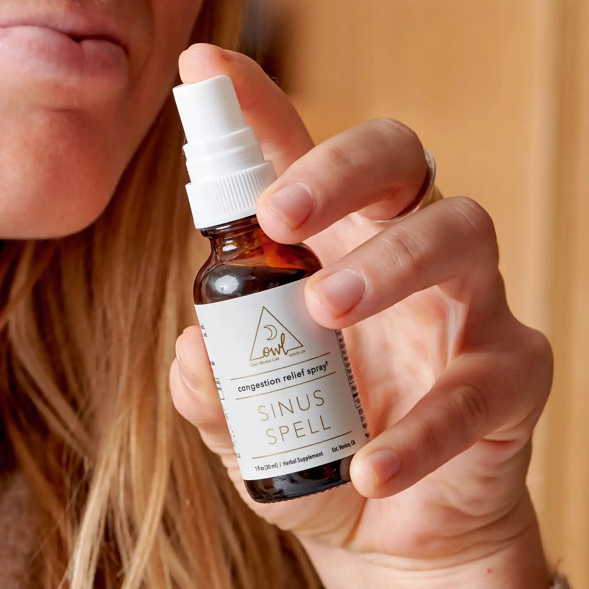 Sinus Spell herbal spray by OWL Venice in an amber glass bottle with a white spray cap on Tampa Home & Garden Store