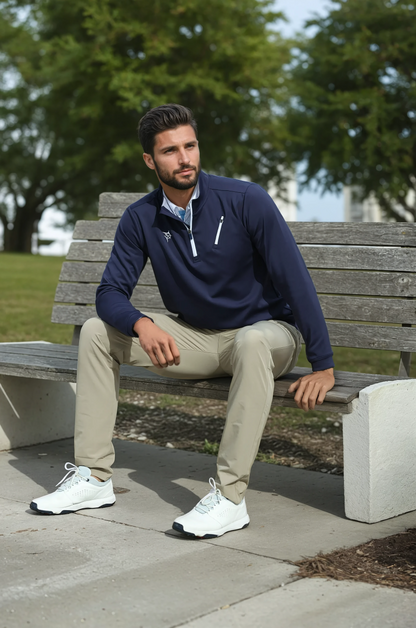 Oceanside Smooth Stretch Pullover navy by White Water Life on a man seated on a park bench on Tampa Home & Garden Store