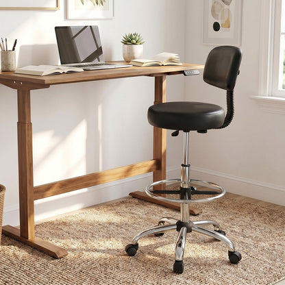 Drafting chair with adjustable height and footring, black vinyl seat, chrome base on Tampa Home & Garden Store