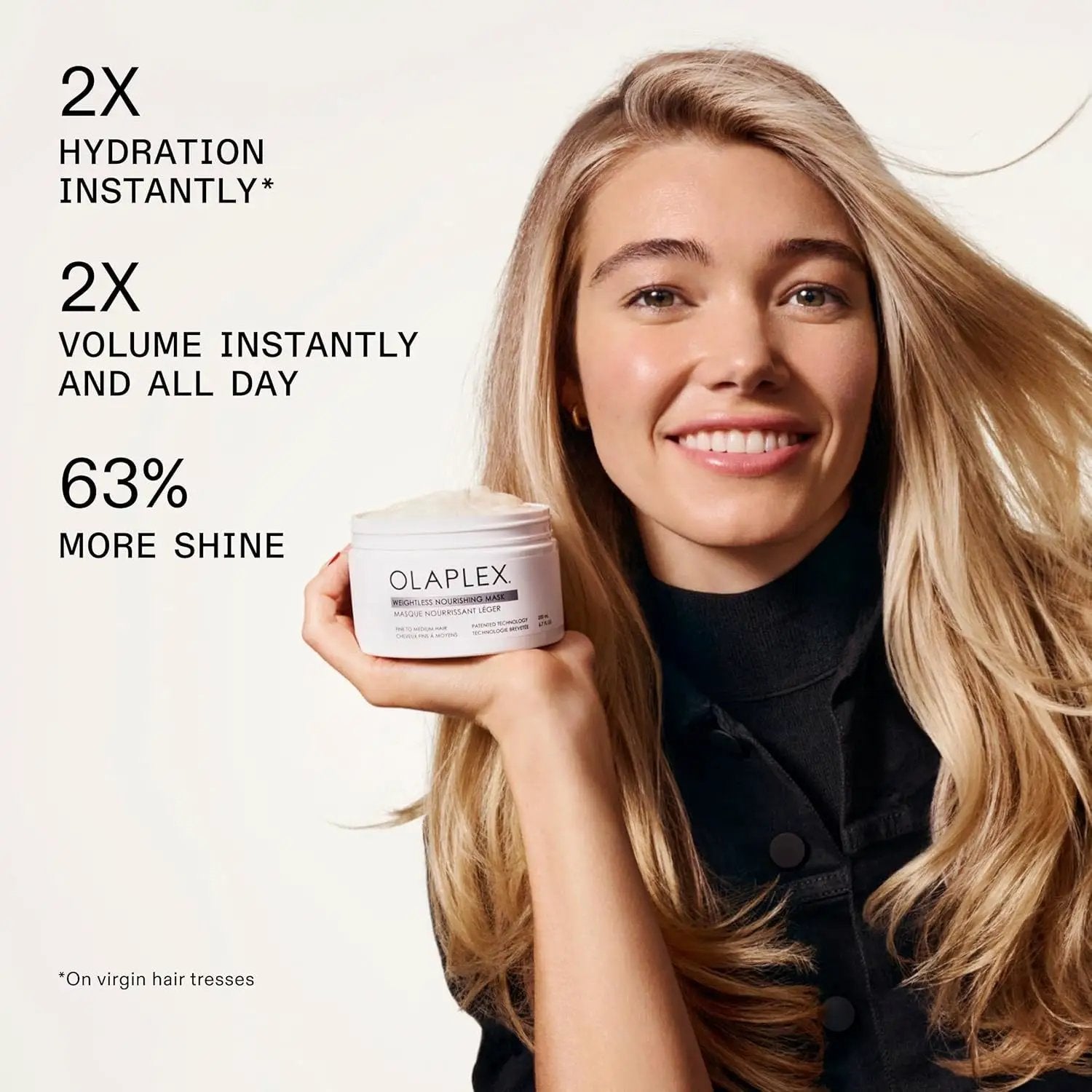 Olaplex Weightless Nourishing Mask jar in white held by blonde model; hair care product on Tampa Home & Garden Store