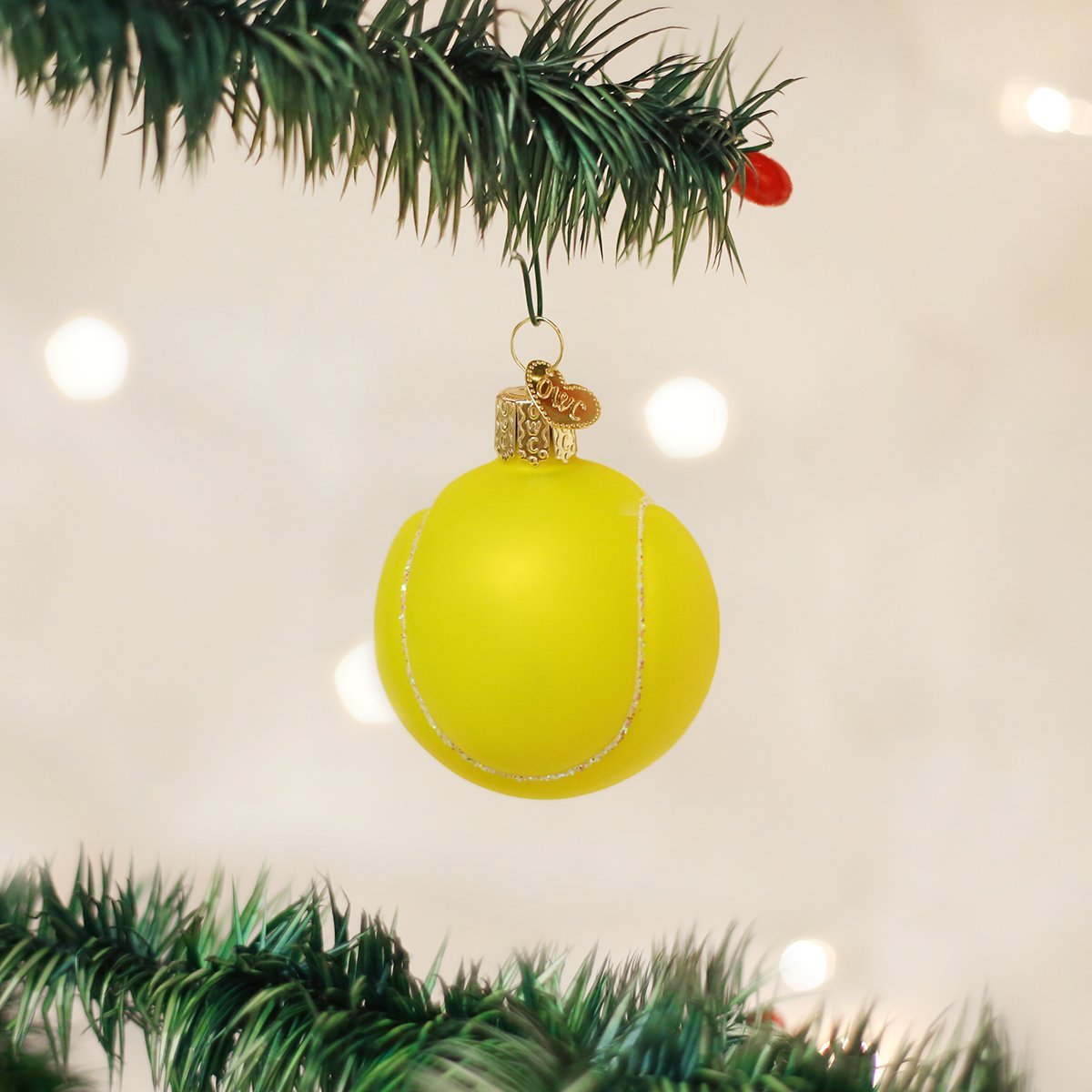 Old World Christmas Tennis Ball Glass Ornament - Tampa Home & Garden Store
