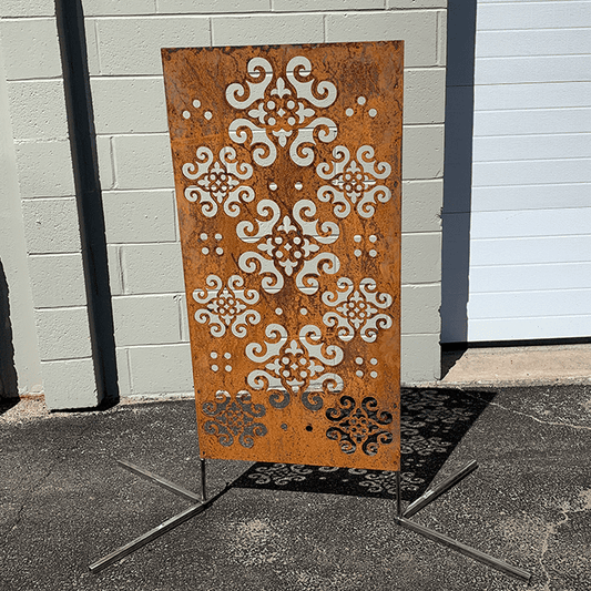 Outdoor privacy panel 46-inch Rustica Ornamentals, rusted metal with cutouts on stand on Tampa Home & Garden Store