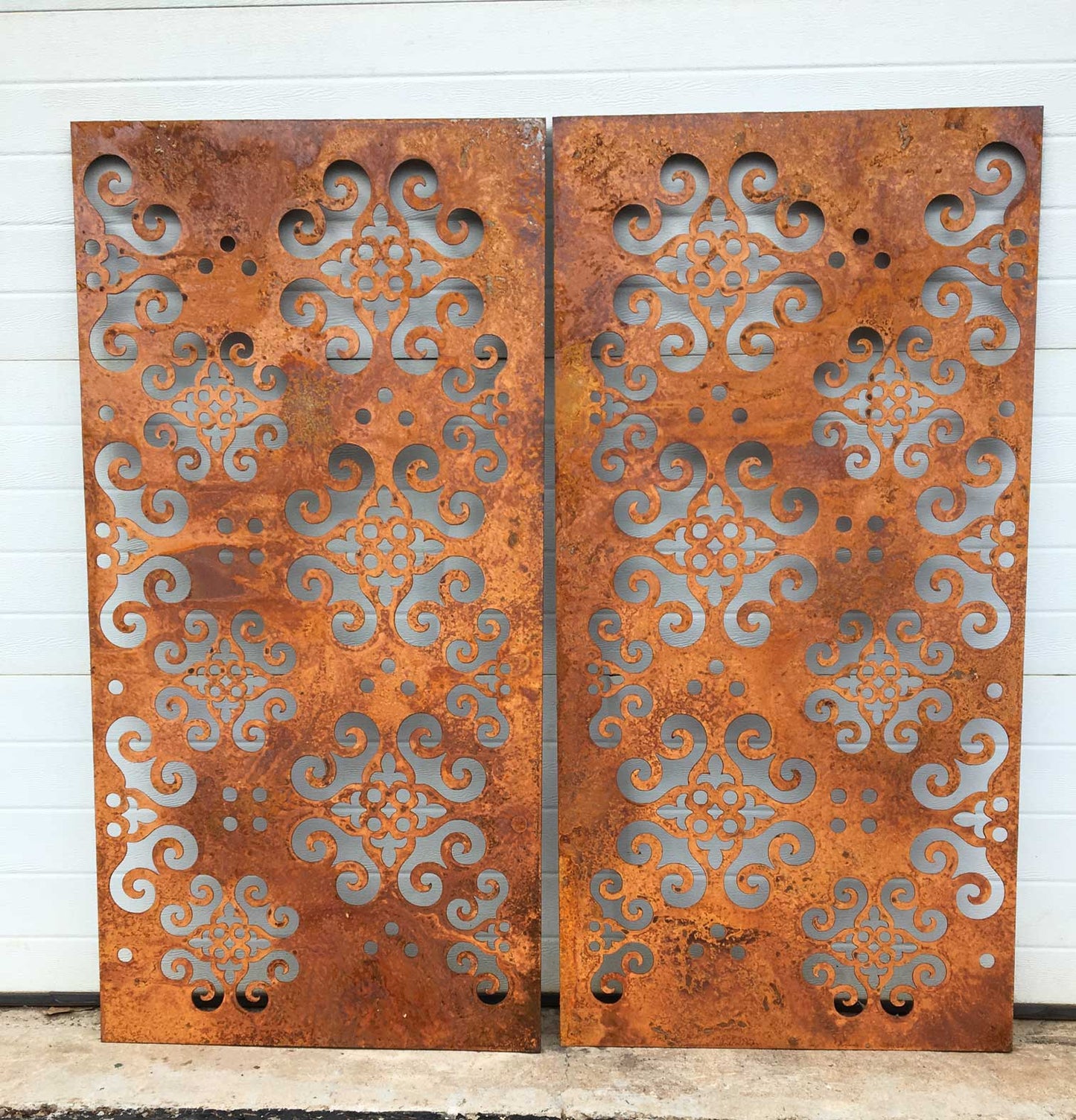 Outdoor privacy panels 46 in rusted metal with scrollwork, two panels by Rustica Ornamentals on Tampa Home & Garden Store