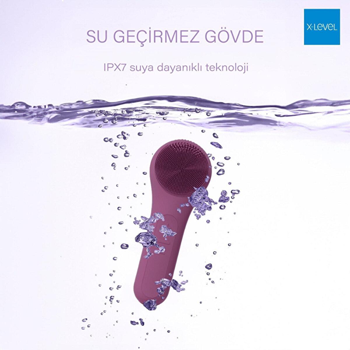 X-Level facial cleansing brush with silicone head, IPX7 water resistant, purple color on Tampa Home & Garden Store