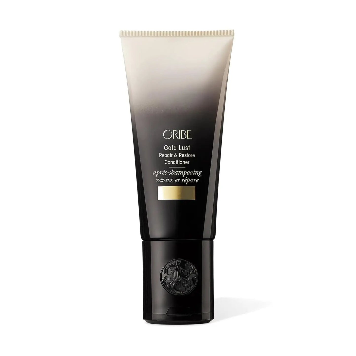 Oribe Gold Lust Repair & Restore Conditioner tube in black to gold gradient with gold label on Tampa Home & Garden Store