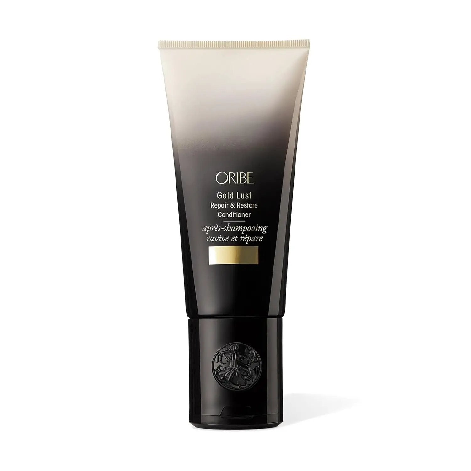 Oribe Gold Lust Repair & Restore Conditioner tube in black to gold gradient with gold label on Tampa Home & Garden Store