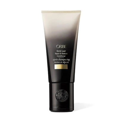 Oribe Gold Lust Repair & Restore Conditioner tube in black to gold gradient with gold label on Tampa Home & Garden Store