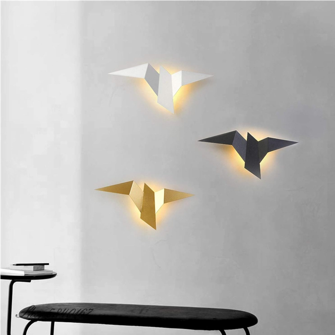 Origami LED Wall Lamp set in white, gold, and dark gray with warm backlit glow on Tampa Home & Garden Store