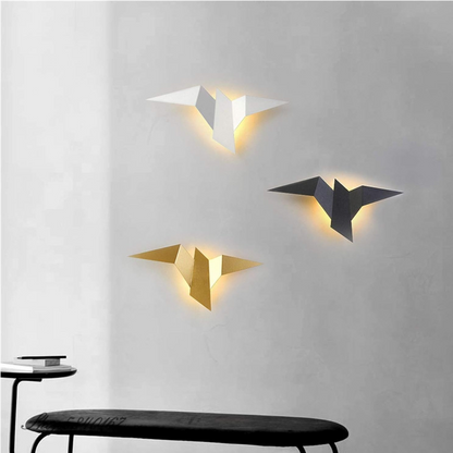 Origami LED Wall Lamp set in white, gold, and dark gray with warm backlit glow on Tampa Home & Garden Store