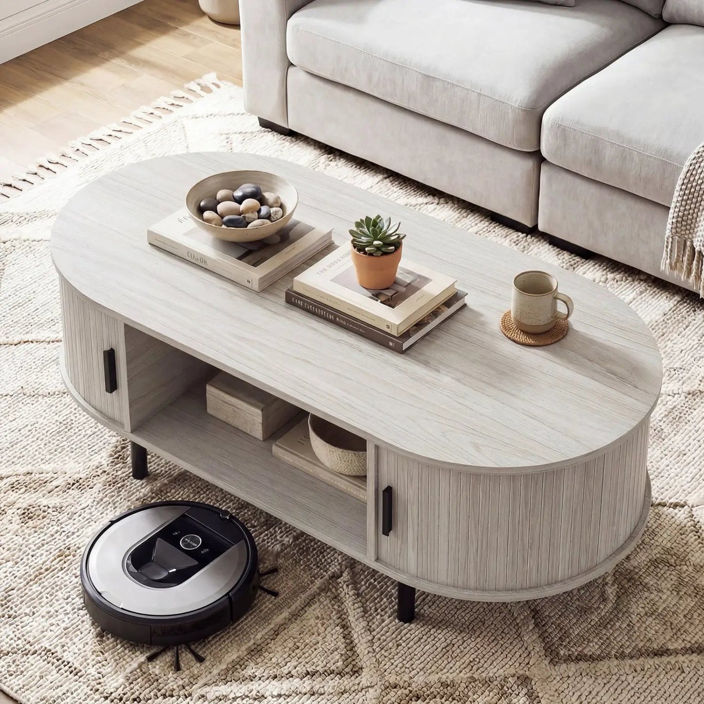 Oval wooden coffee table, storage in light ash, DirectDeals, books, plant and mug on rug on Tampa Home & Garden Store