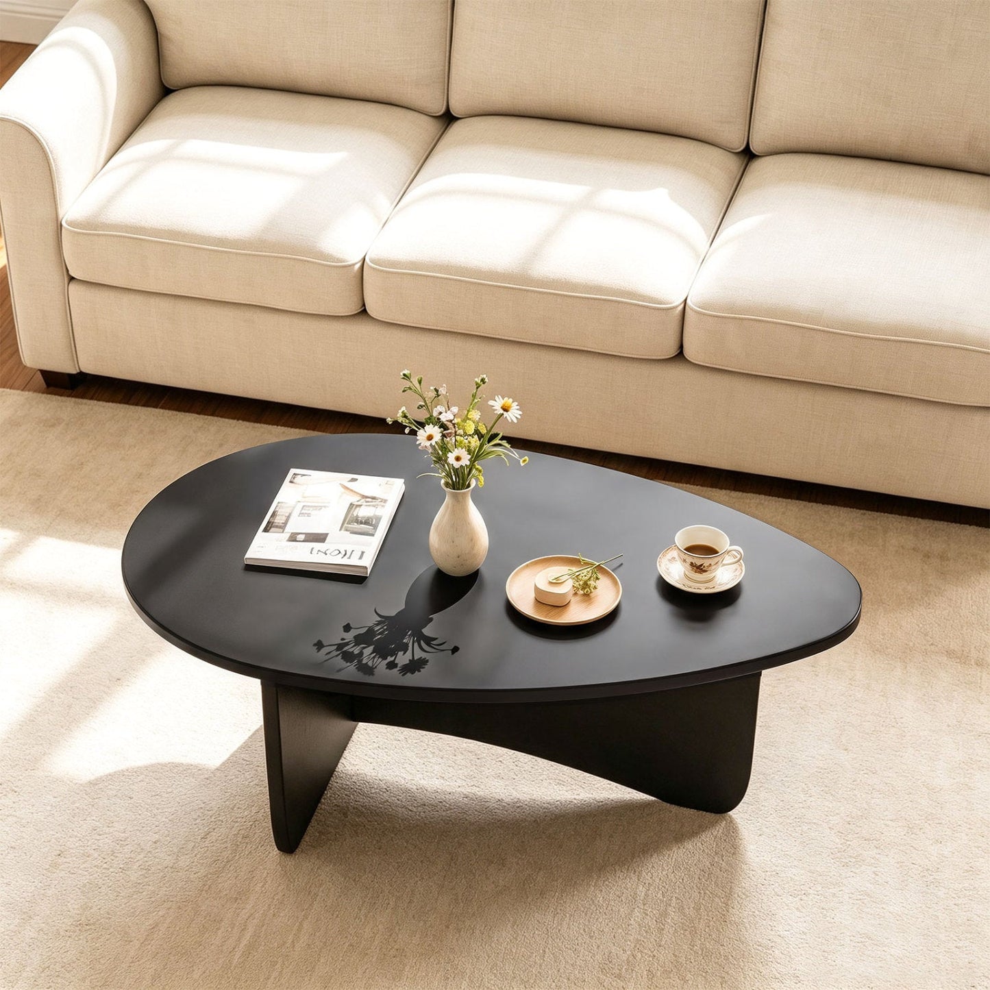 Oval coffee table, dark wood, mid-century modern low-profile DirectDeals with vase and magazine on Tampa Home & Garden Store