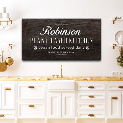 Plant Based Kitchen Sign canvas by Tailored Canvases with dark wood grain and white typography on Tampa Home & Garden Store