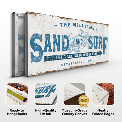 Sand And Surf sign canvas by Tailored Canvases with rust-streaked edges and blue typography on Tampa Home & Garden Store