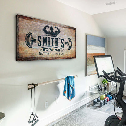 Gym Sign V canvas wall art with rustic wood background, flexed figure, and Dallas Texas text on Tampa Home & Garden Store