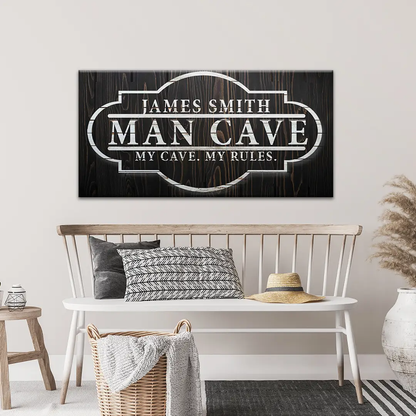 Canvas sign My Cave My Rules by Tailored Canvases on dark woodgrain with white lettering on Tampa Home & Garden Store