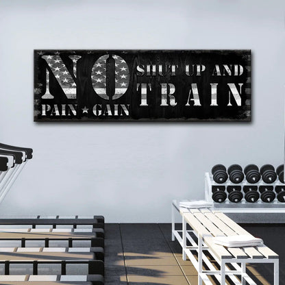 No Pain No Gain canvas sign with distressed black wood background and bold white lettering on Tampa Home & Garden Store