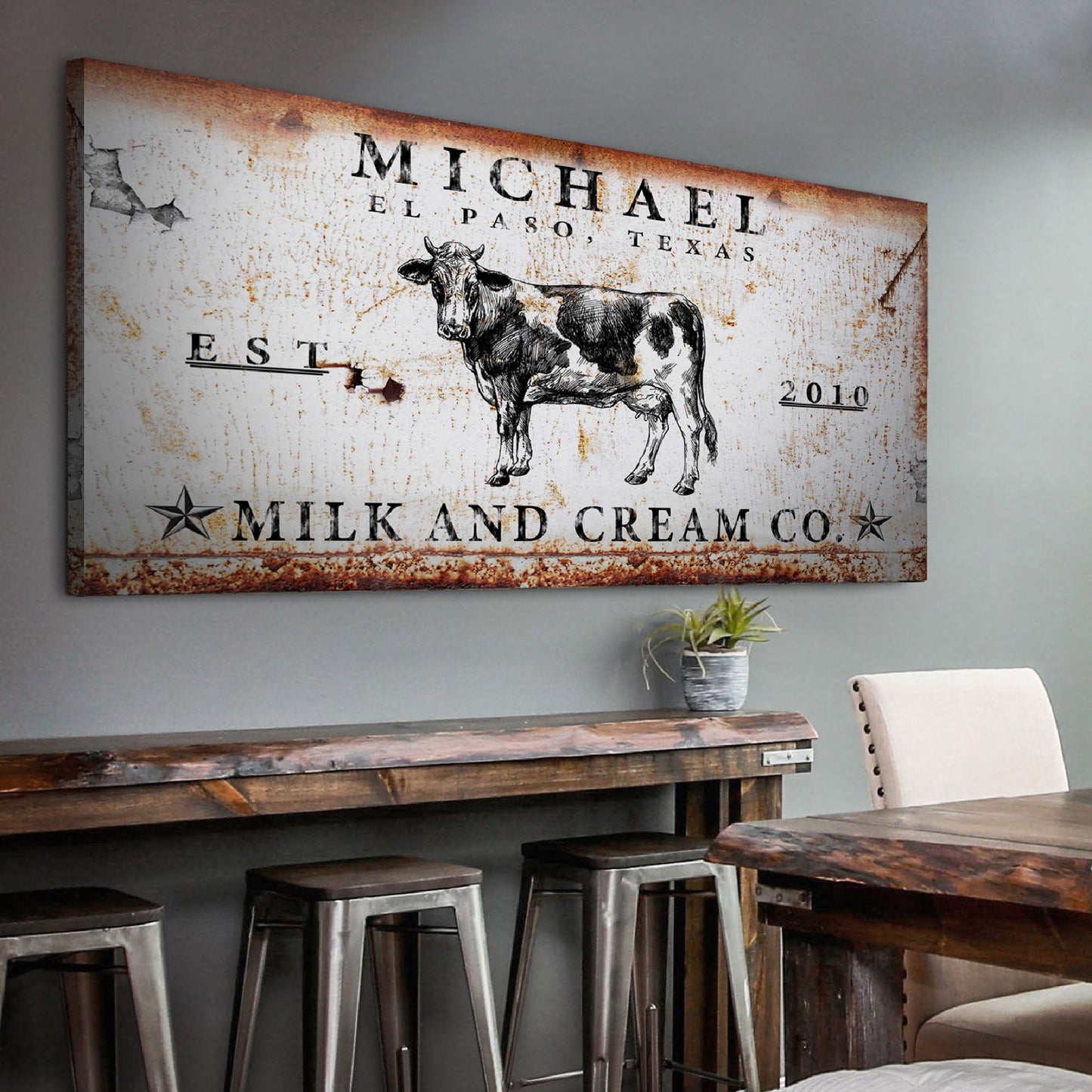 Milk and Cream Co Sign Canvas with distressed rust background and cow illustration on Tampa Home & Garden Store