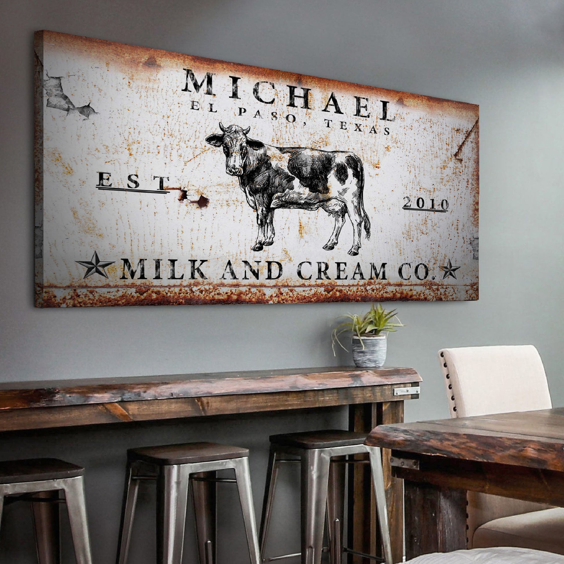 Milk and Cream Co Sign Canvas with distressed rust background and cow illustration on Tampa Home & Garden Store