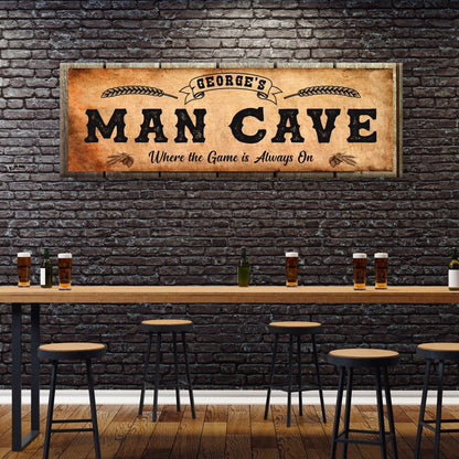Tailored Canvases canvas sign George's Man Cave with rustic parchment banner on brick wall on Tampa Home & Garden Store