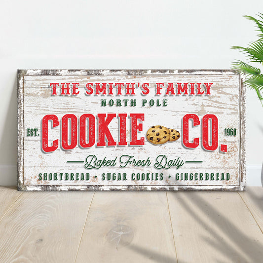 Christmas Cookie Co sign canvas by Tailored Canvases, distressed white frame and cookie graphic on Tampa Home & Garden Store