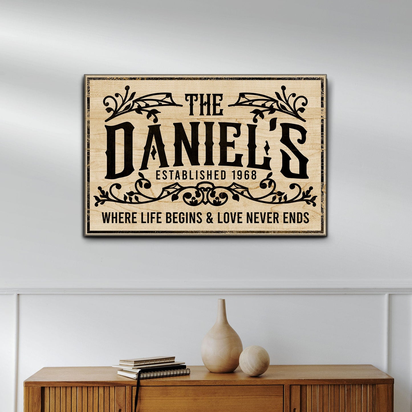 Canvas sign The Daniels Established 1968 rustic wood plaque with ornate black typography on Tampa Home & Garden Store
