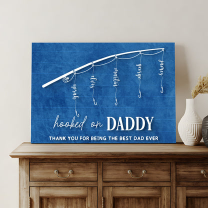 Blue canvas sign with white string lights and hooked on beside bold DADDY Father's Day on Tampa Home & Garden Store
