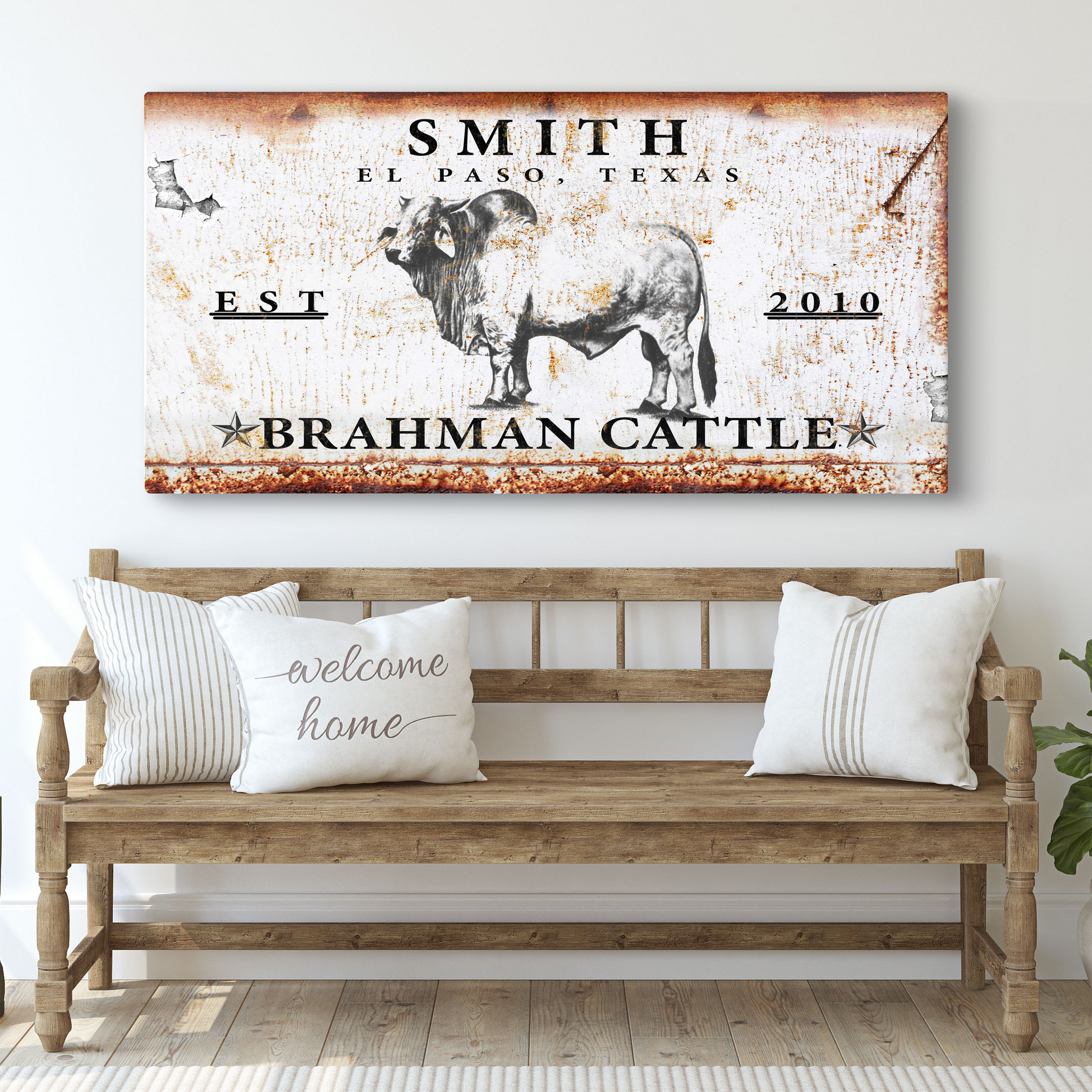 Brahman Cattle canvas sign by Tailored Canvases with rustic background and bold lettering on Tampa Home & Garden Store