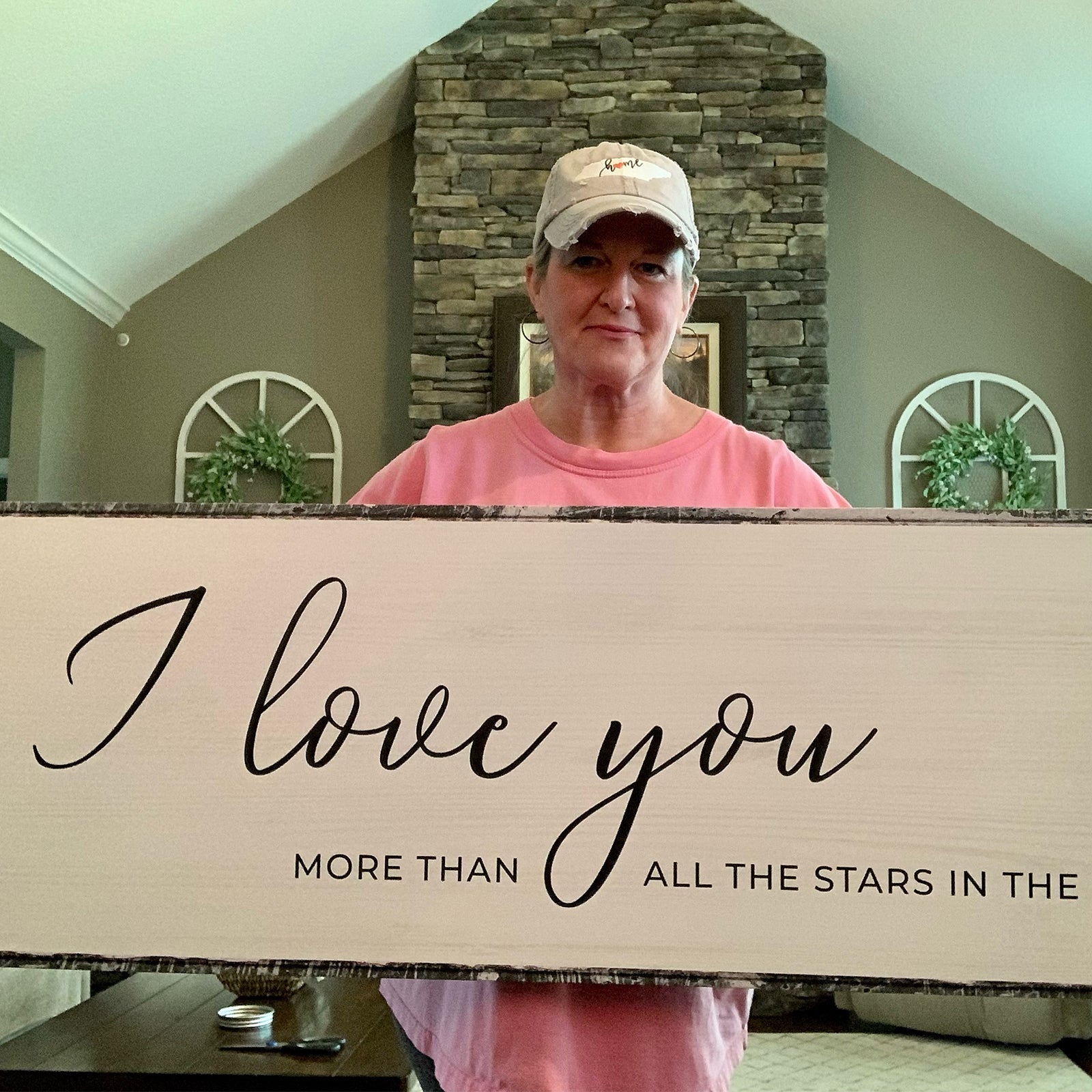 Custom Saying Sign canvas with I love you script held by a person in a pink shirt on Tampa Home & Garden Store