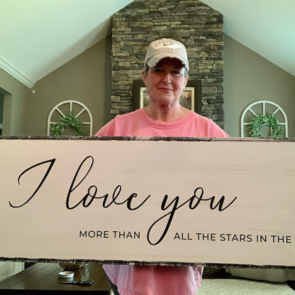 Custom Saying Sign canvas with I love you script held by a person in a pink shirt on Tampa Home & Garden Store