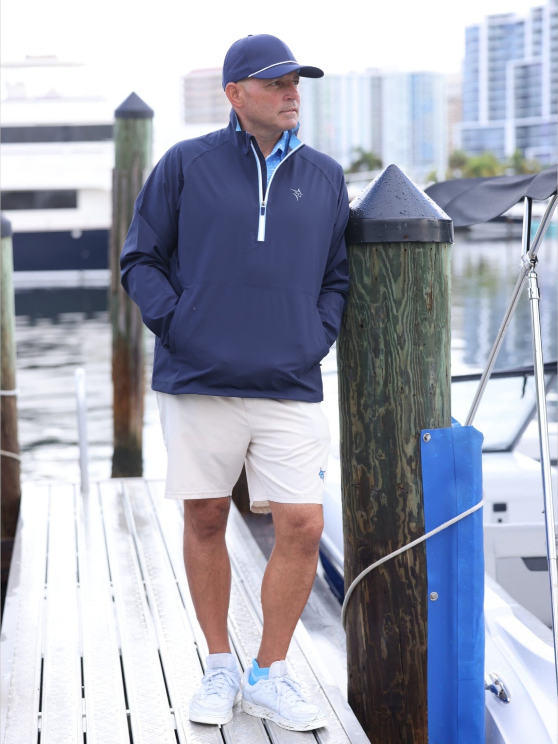 Palm Beach Waterproof Quarter Zip navy blue jacket with light blue zipper White Water Life logo on Tampa Home & Garden Store