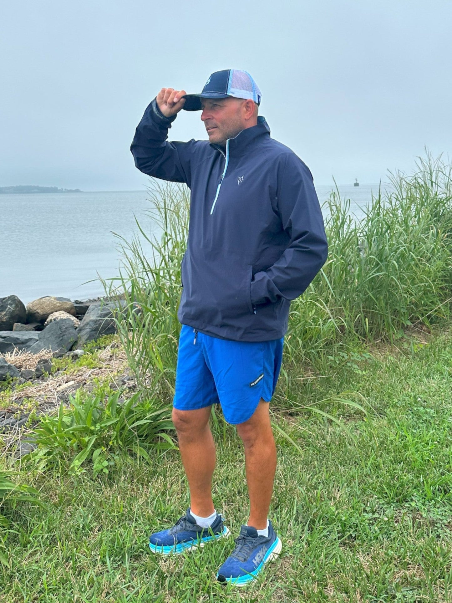 Palm Beach Waterproof Quarter Zip by White Water Life navy jacket with light blue zipper on Tampa Home & Garden Store