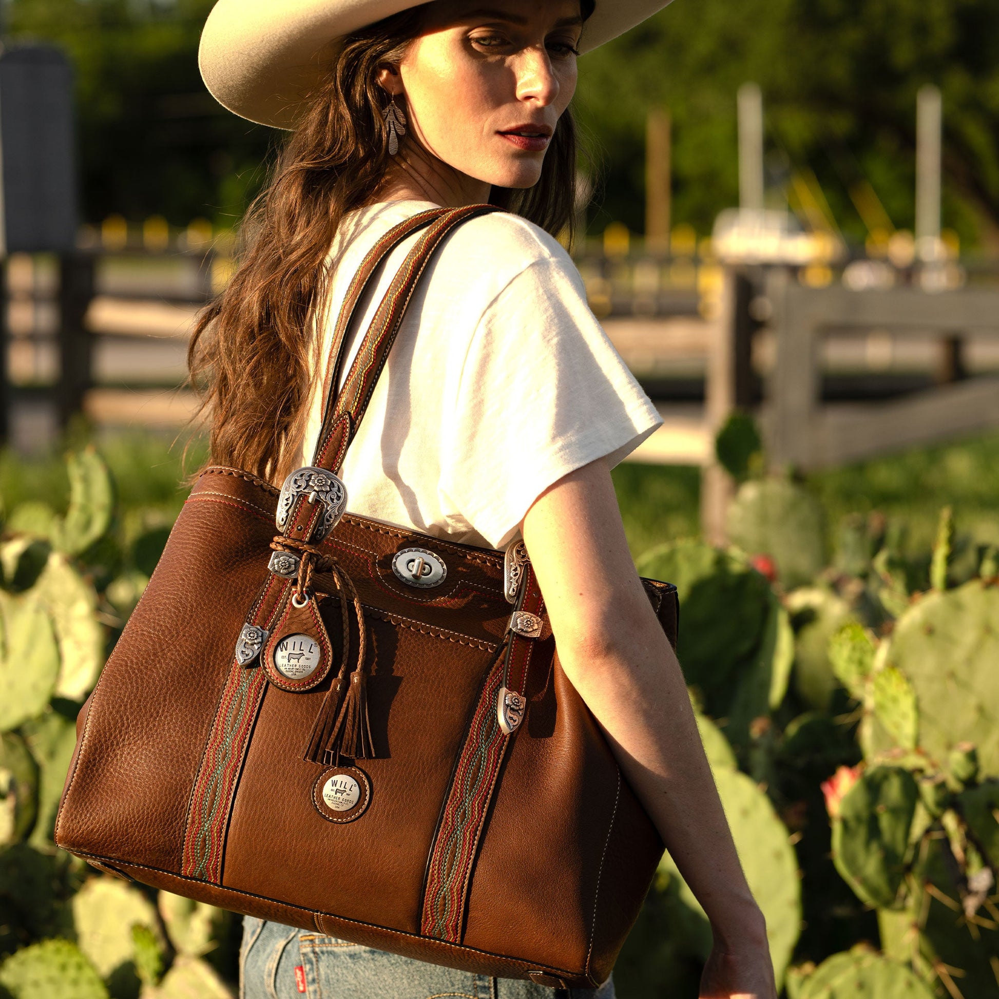 El Paso Work Tote brown leather with conchos, braided strap, Will Leather Goods logo patch on Tampa Home & Garden Store