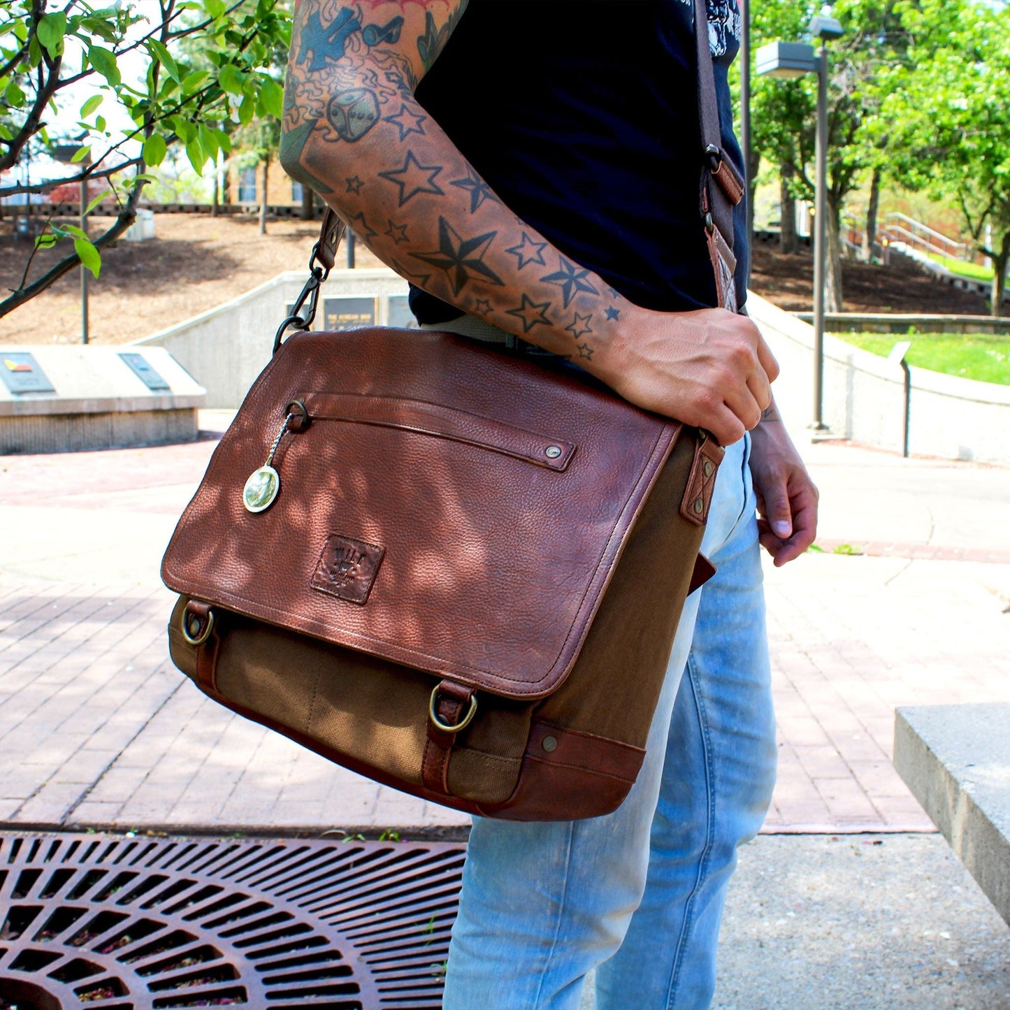 Wallace Messenger Bag by Will Leather Goods brown leather bag with front flap and brass hardware on Tampa Home & Garden Store
