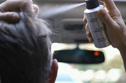 Bravo Sierra gray dry shampoo spray being applied to hair in car interior on Tampa Home & Garden Store