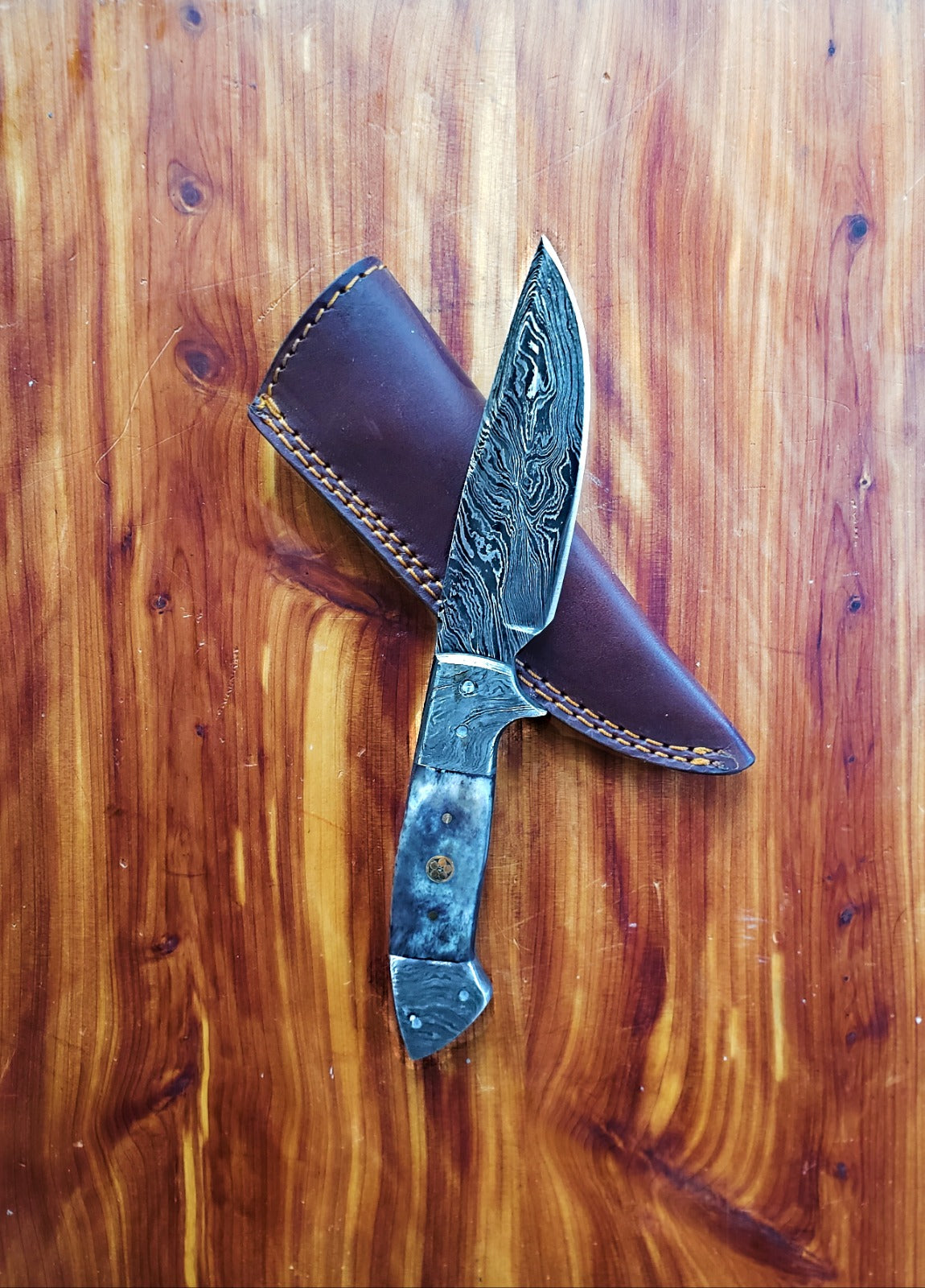 TD-005 Titan International K Damascus blade knife with blue-gray handle and brown leather sheath on Tampa Home & Garden Store